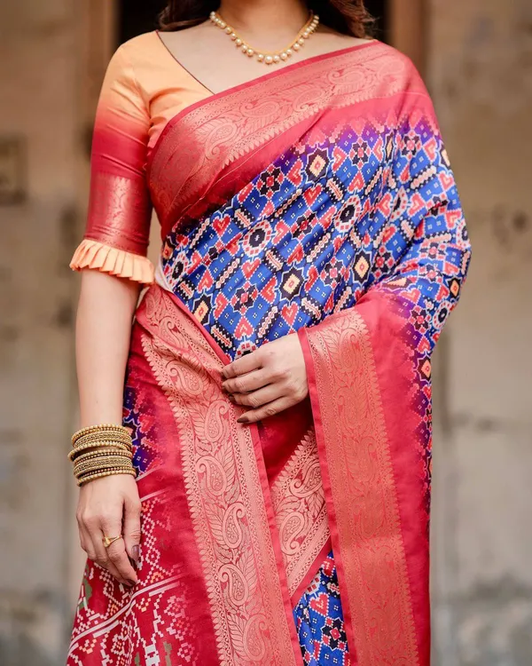 Royal_Blue_and_Red_Tussar_Silk_Saree_with_Geometric_Patterns_and_Ornate_Zari_Border