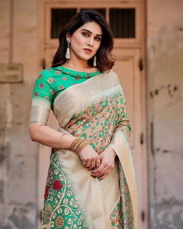 Emerald_Green_and_Gold_Tussar_Silk_Saree_with_Floral_and_Ornamental_Motifs