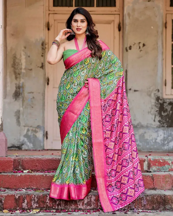 Green_and_Pink_Tussar_Silk_Saree_with_Vibrant_Ikat_Patterns_and_Zari_Border