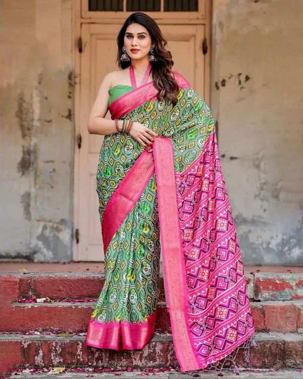 Green_and_Pink_Tussar_Silk_Saree_with_Vibrant_Ikat_Patterns_and_Zari_Border