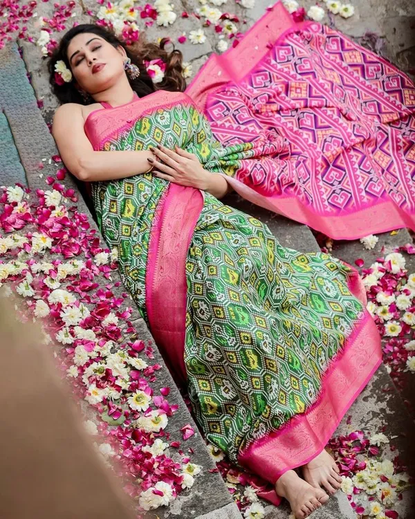 Green_and_Pink_Tussar_Silk_Saree_with_Vibrant_Ikat_Patterns_and_Zari_Border