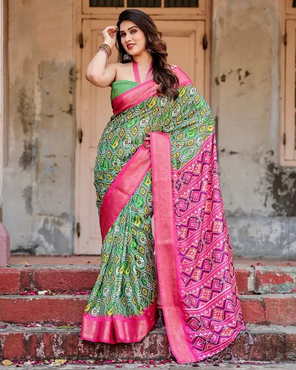 Green_and_Pink_Tussar_Silk_Saree_with_Vibrant_Ikat_Patterns_and_Zari_Border