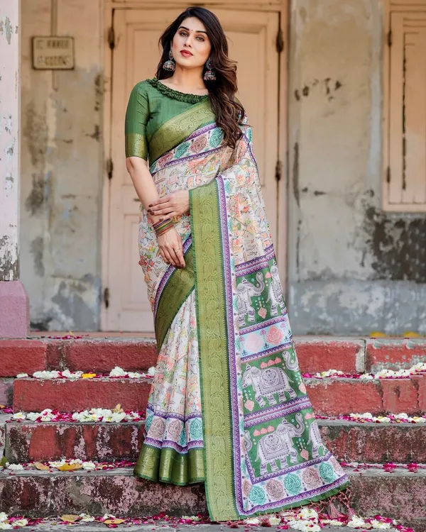 Ivory_and_Green_Tussar_Silk_Saree_with_Elephant_Motifs_and_Intricate_Zari_Border