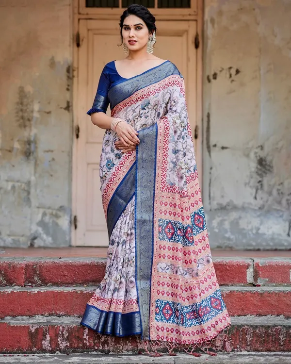Ivory_and_Navy_Blue_Tussar_Silk_Saree_with_Floral_Elegance_and_Ornamental_Zari_Work