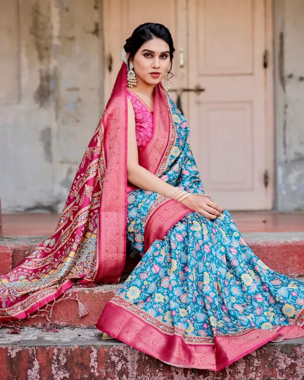 Teal_Blue_and_Coral_Tussar_Silk_Saree_with_Vibrant_Floral_Motifs_and_Ornamental_Pallu