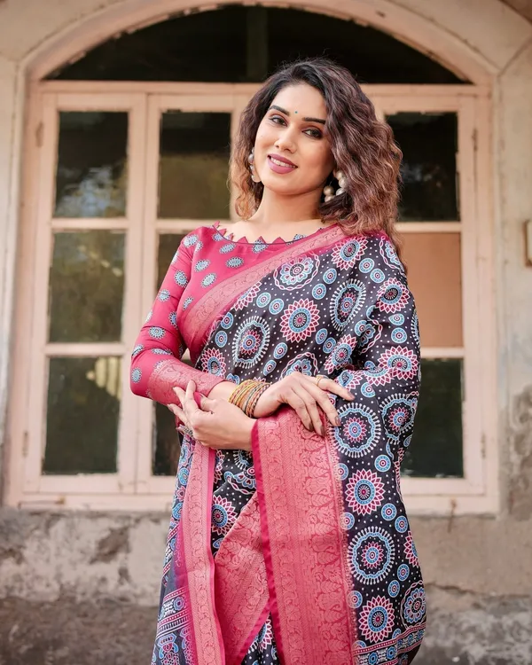 Black_and_Coral_Tussar_Silk_Saree_with_Intricate_Circular_Motifs_and_Ornamental_Pallu