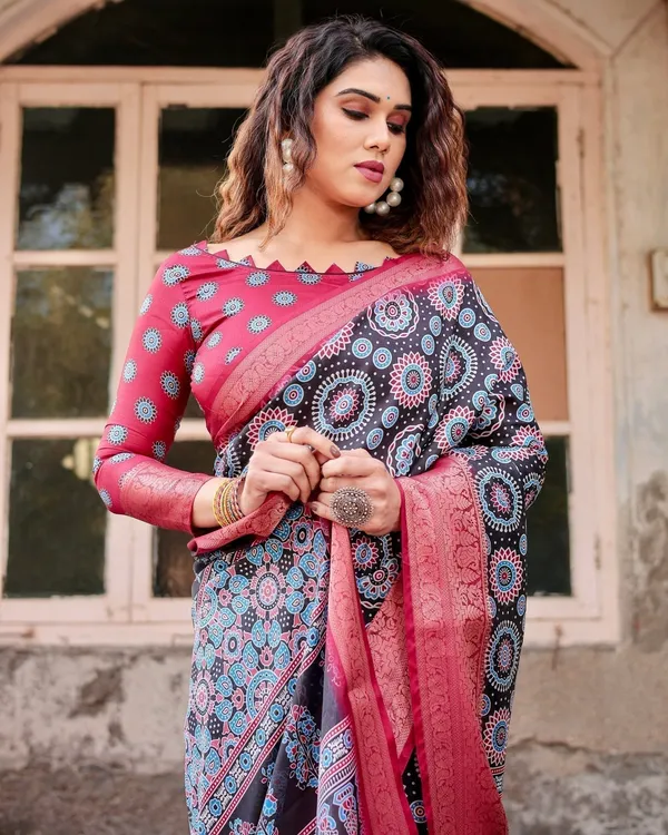 Black_and_Coral_Tussar_Silk_Saree_with_Intricate_Circular_Motifs_and_Ornamental_Pallu