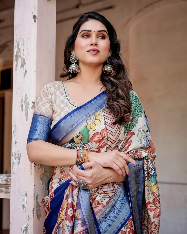Multicolor_Tussar_Silk_Saree_with_Artistic_Floral_Motifs_and_Traditional_Blue_Zari_Border