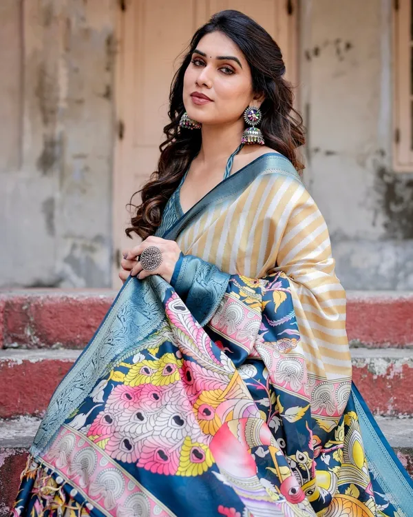 Beige_&_Teal_Tussar_Silk_Saree_with_Intricate_Kalamkari_and_Zari_Border