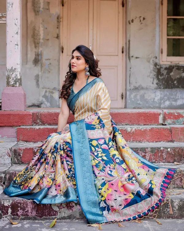 Beige_&_Teal_Tussar_Silk_Saree_with_Intricate_Kalamkari_and_Zari_Border