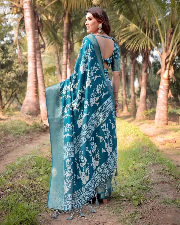 Teal_Blue_Tussar_Silk_Saree_with_White_Floral_Design,_Gold_Zari_Border_&_Tassel_Pallu