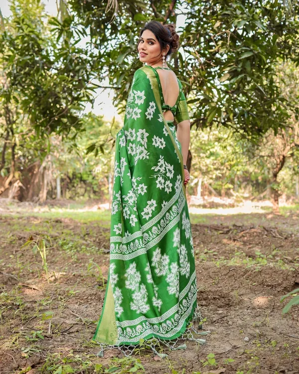 Enchanting_Green_Tussar_Silk_Saree_with_White_Floral_Prints_and_Zari_Border