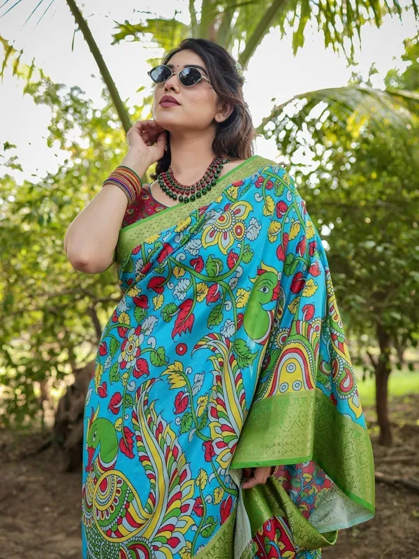 Vibrant_Peacock_Motif_Blue_and_Green_Tussar_Silk_Saree_with_Zari_Border