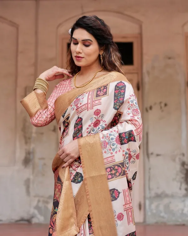 Ivory_Tussar_Silk_Saree_with_Artistic_Floral_Motifs_and_Gleaming_Golden_Zari_Border