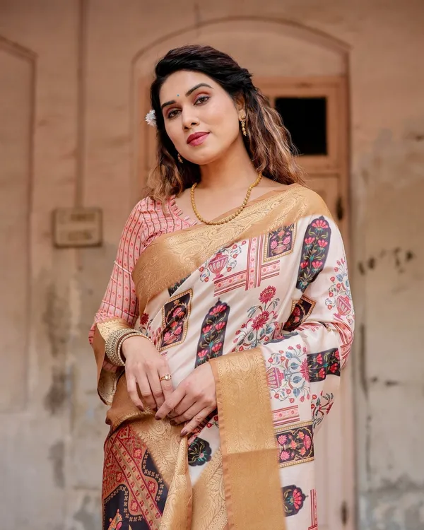 Ivory_Tussar_Silk_Saree_with_Artistic_Floral_Motifs_and_Gleaming_Golden_Zari_Border
