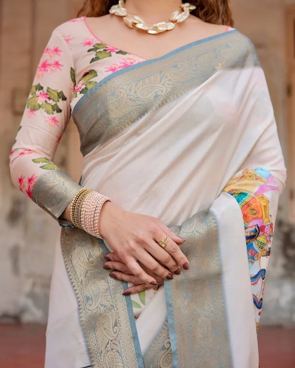 Ivory_Tussar_Silk_Saree_with_Handcrafted_Elephant_Motif_Pallu_and_Golden_Zari_Border