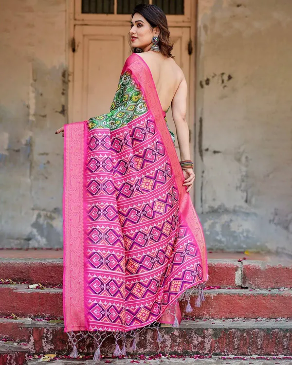 Green_and_Pink_Tussar_Silk_Saree_with_Vibrant_Ikat_Patterns_and_Zari_Border