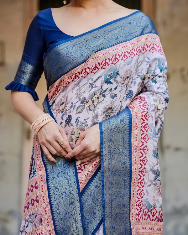 Ivory_and_Navy_Blue_Tussar_Silk_Saree_with_Floral_Elegance_and_Ornamental_Zari_Work