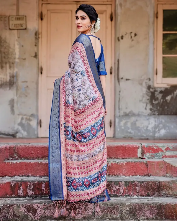 Ivory_and_Navy_Blue_Tussar_Silk_Saree_with_Floral_Elegance_and_Ornamental_Zari_Work