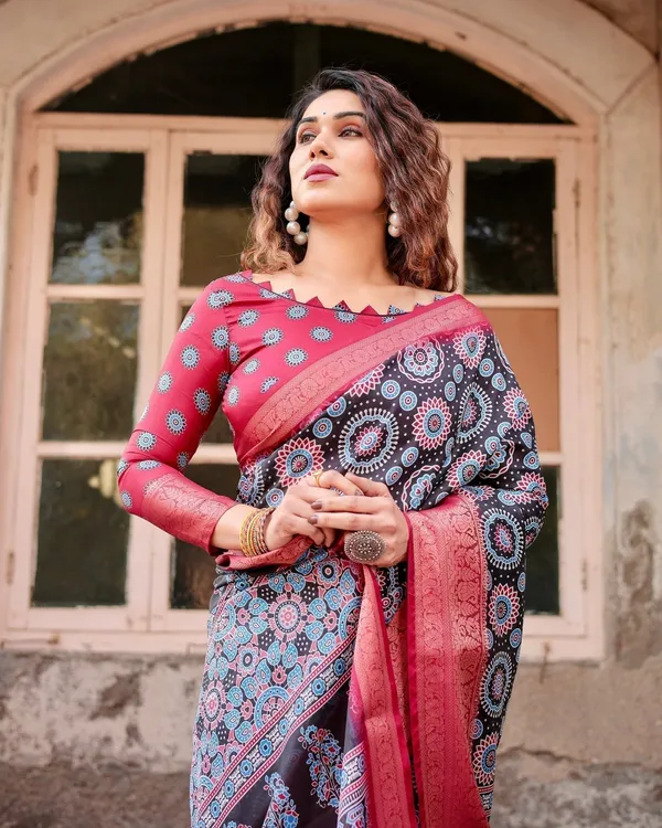 Black_and_Coral_Tussar_Silk_Saree_with_Intricate_Circular_Motifs_and_Ornamental_Pallu