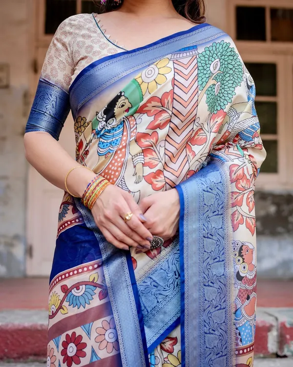 Multicolor_Tussar_Silk_Saree_with_Artistic_Floral_Motifs_and_Traditional_Blue_Zari_Border