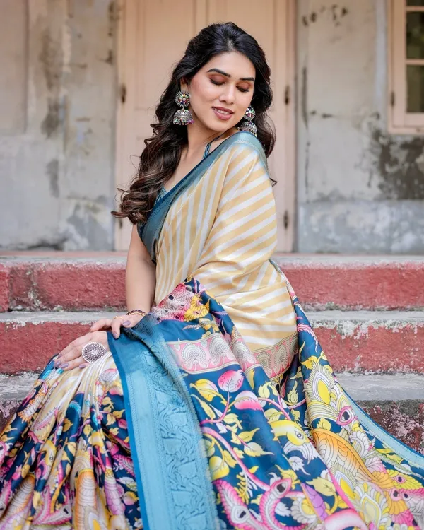 Beige_&_Teal_Tussar_Silk_Saree_with_Intricate_Kalamkari_and_Zari_Border