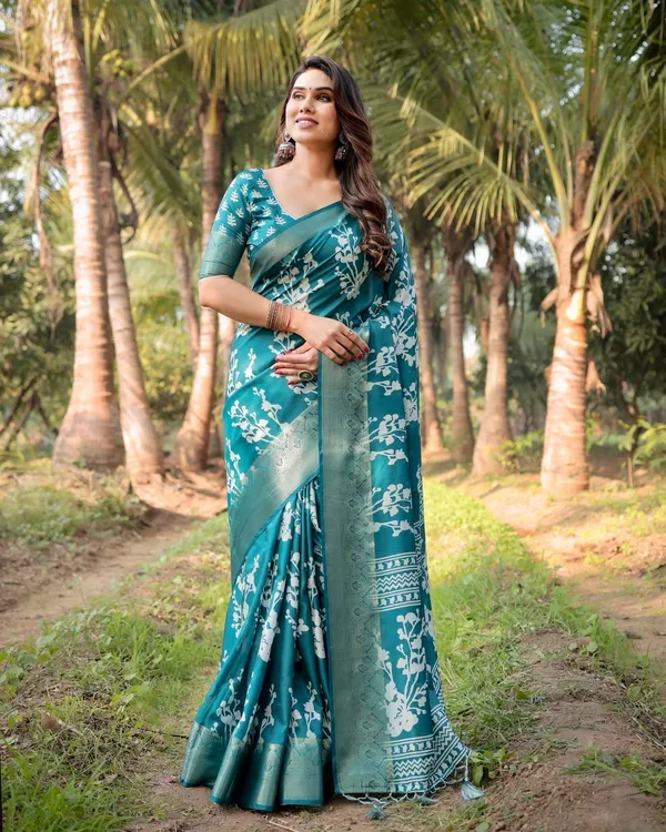 Teal_Blue_Tussar_Silk_Saree_with_White_Floral_Design,_Gold_Zari_Border_&_Tassel_Pallu