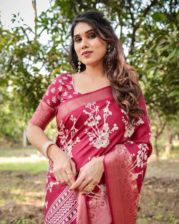 Maroon_Tussar_Silk_Saree_with_White_Floral_Motifs,_Intricate_Zari_Border,_and_Elegant_Tassel_Pallu