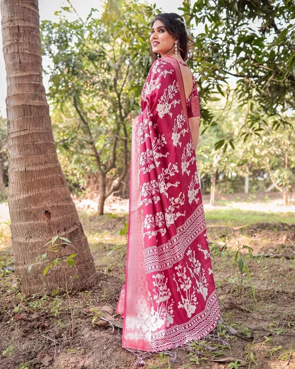 Maroon_Tussar_Silk_Saree_with_White_Floral_Motifs,_Intricate_Zari_Border,_and_Elegant_Tassel_Pallu