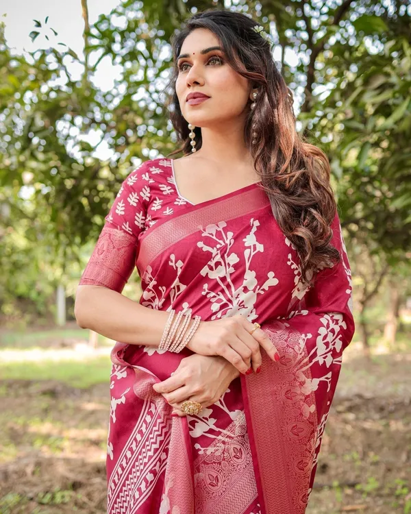 Maroon_Tussar_Silk_Saree_with_White_Floral_Motifs,_Intricate_Zari_Border,_and_Elegant_Tassel_Pallu