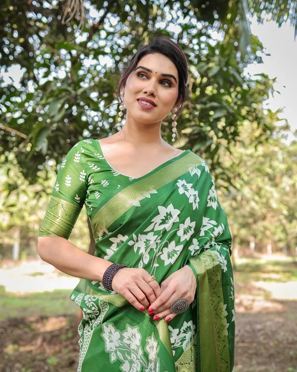 Enchanting_Green_Tussar_Silk_Saree_with_White_Floral_Prints_and_Zari_Border