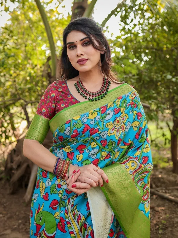 Vibrant_Peacock_Motif_Blue_and_Green_Tussar_Silk_Saree_with_Zari_Border