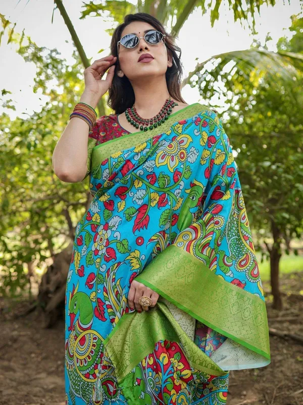 Vibrant_Peacock_Motif_Blue_and_Green_Tussar_Silk_Saree_with_Zari_Border