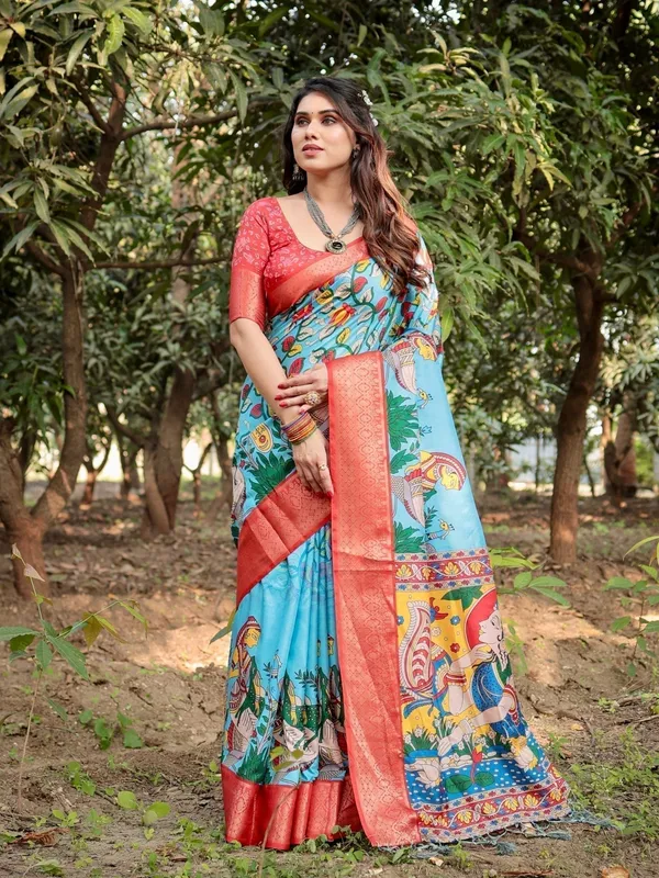 Aqua_Blue_Tussar_Silk_Saree_with_Vibrant_Nature-Inspired_Prints_and_Red_Zari_Border