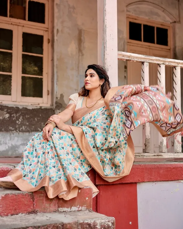 Contemporary_Beige_Tussar_Silk_Saree_with_Geometric_Triangle_Print_and_Golden_Zari_Border
