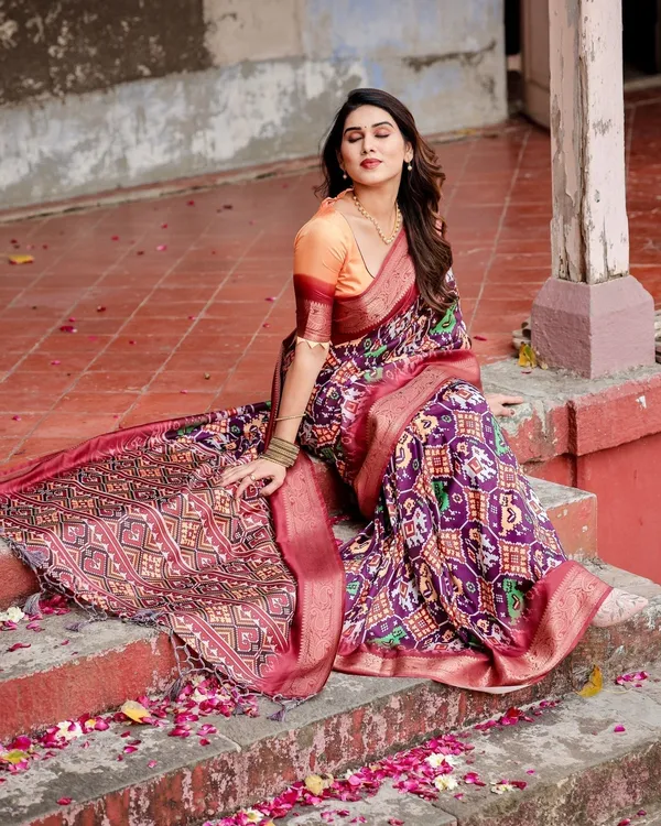 Wine_Purple_Tussar_Silk_Saree_with_Ikat-Inspired_Patterns_and_Rich_Zari_Border