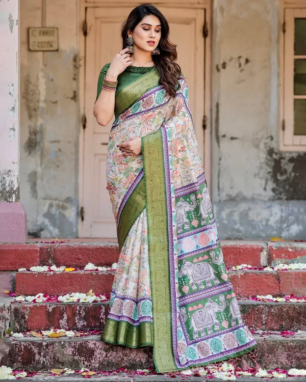 Ivory_and_Green_Tussar_Silk_Saree_with_Elephant_Motifs_and_Intricate_Zari_Border