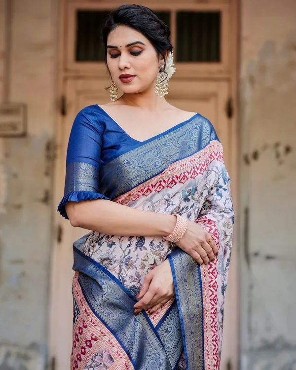 Ivory_and_Navy_Blue_Tussar_Silk_Saree_with_Floral_Elegance_and_Ornamental_Zari_Work