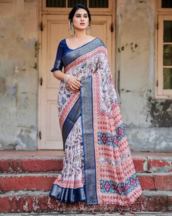Ivory_and_Navy_Blue_Tussar_Silk_Saree_with_Floral_Elegance_and_Ornamental_Zari_Work