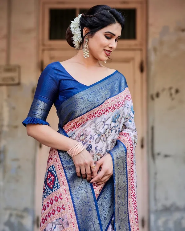 Ivory_and_Navy_Blue_Tussar_Silk_Saree_with_Floral_Elegance_and_Ornamental_Zari_Work
