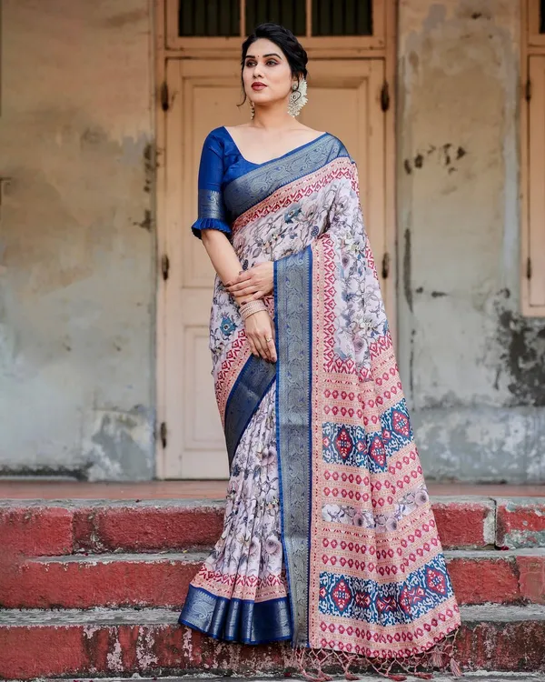 Ivory_and_Navy_Blue_Tussar_Silk_Saree_with_Floral_Elegance_and_Ornamental_Zari_Work