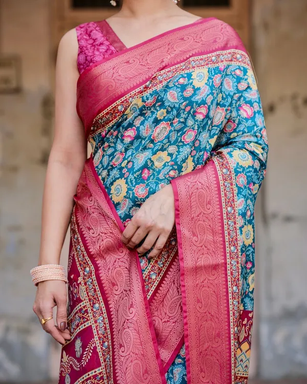 Teal_Blue_and_Coral_Tussar_Silk_Saree_with_Vibrant_Floral_Motifs_and_Ornamental_Pallu