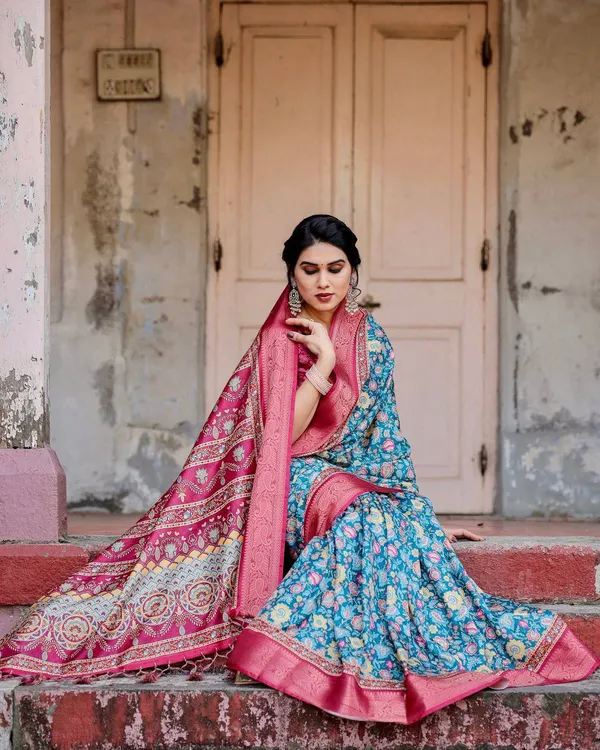 Teal_Blue_and_Coral_Tussar_Silk_Saree_with_Vibrant_Floral_Motifs_and_Ornamental_Pallu
