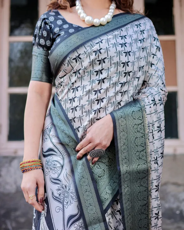Monochrome_White_and_Black_Tussar_Silk_Saree_with_Tribal_Art_Motifs_and_Zari_Border