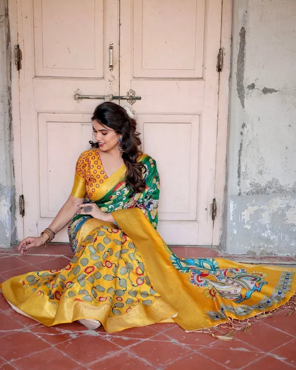 Golden_Yellow_Tussar_Silk_Saree_with_Vibrant_Peacock_Kalamkari_Motifs