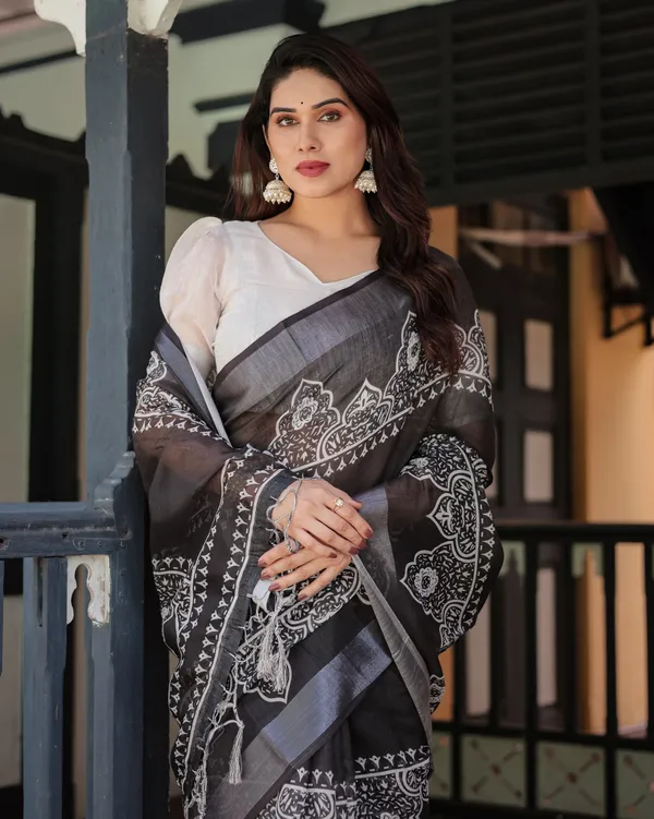 Black_and_White_Pure_Cotton_Linen_Saree_with_Intricate_Floral_Design_and_Tassels_on_Edges