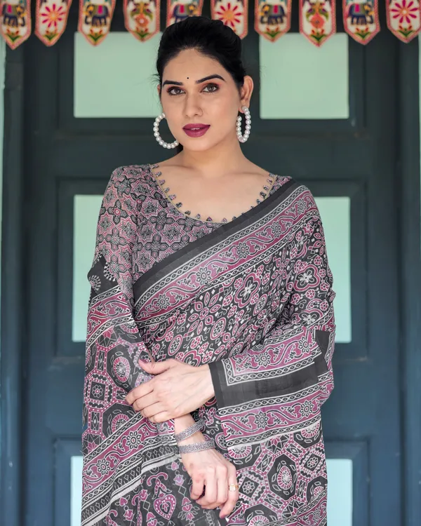 Black_Pure_Cotton_Linen_Saree_with_Pink_Striped_Pallu_and_Tassel_Accents
