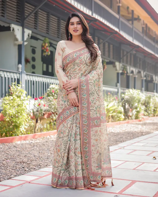 Ivory_Handloom_Cotton-Linen_Saree_with_Floral_and_Peacock_Motifs,_Zari_Highlights,_and_Tassel_Finish