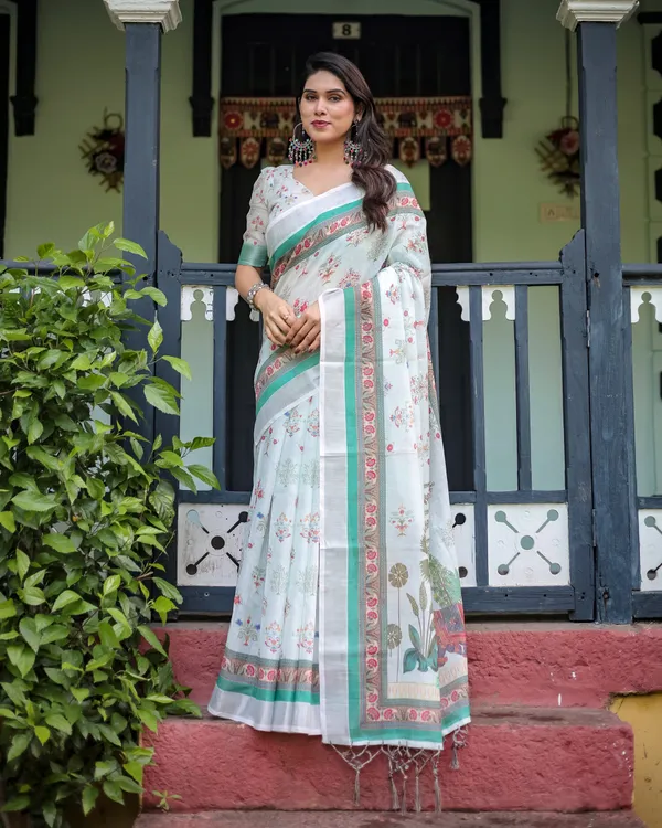 Ivory_Pure_Cotton_Linen_Saree_with_Elephant_Motif_and_Floral_Pattern,_Green_and_Pink_Borders,_and_Tassels_on_Edges.