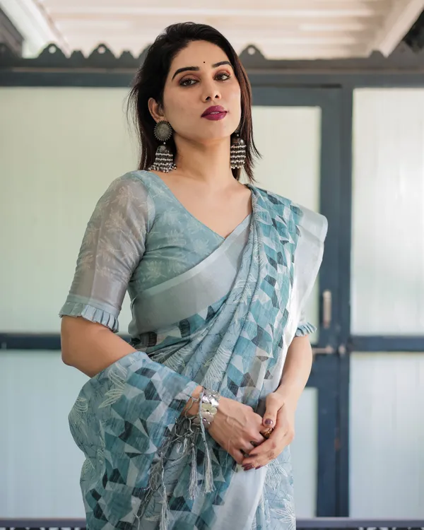 Light_Blue_Pure_Cotton_Linen_Saree_with_Geometric_and_Floral_Patterns,_Blouse,_and_Tassels
